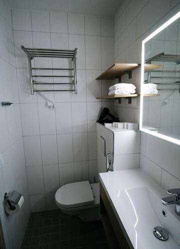 Фото номера Двухместный номер эконом-класса с 2 отдельными кроватями Отель Hotelli Toivola г. Кеми 9