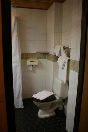 Фото номера Небольшой двухместный номер с 2 отдельными кроватями Отель Hotel Palomestari г. Кеми 2