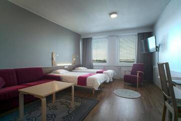 Фото номера Двухместный номер с 2 отдельными кроватями Отель Hotel Palomestari г. Кеми 3