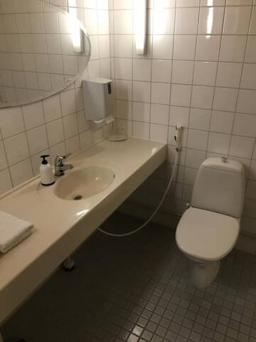 Фото номера Двухместный номер с 2 отдельными кроватями Отель Hotel Yöpuu г. Кеми 9