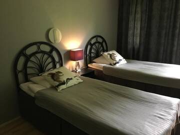 Фото номера Двухместный номер с 2 отдельными кроватями Отель Hotel Yöpuu г. Кеми 8